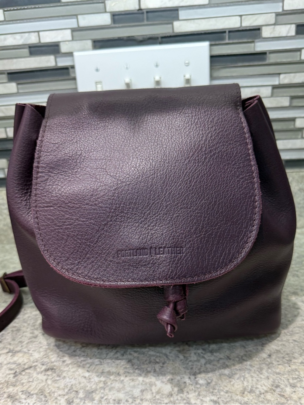 Portland Leather plum Bucket Backpack